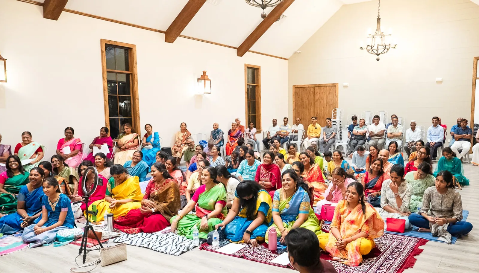 Families and devotees gathered together for a Murugan devotional program